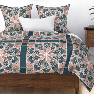 Duvet of patchwork star quilt in peach and blue