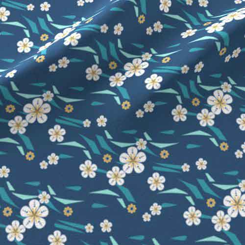 Dark blue fabric with yellow flowers and teal waves