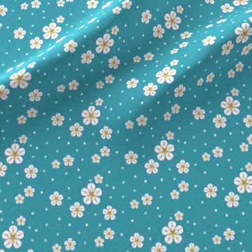 Ditzy fabric print of yellow flowers on teal