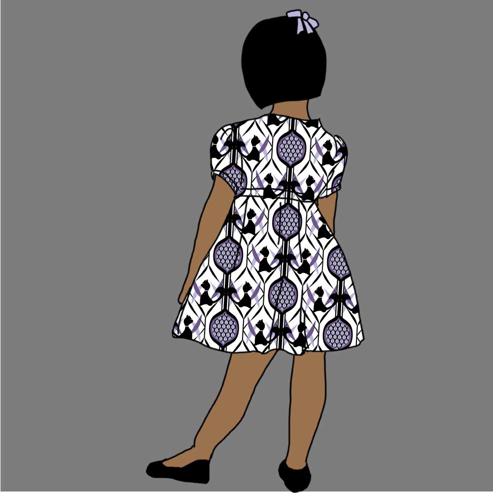 Child's dress with black and white cats and purple pattern