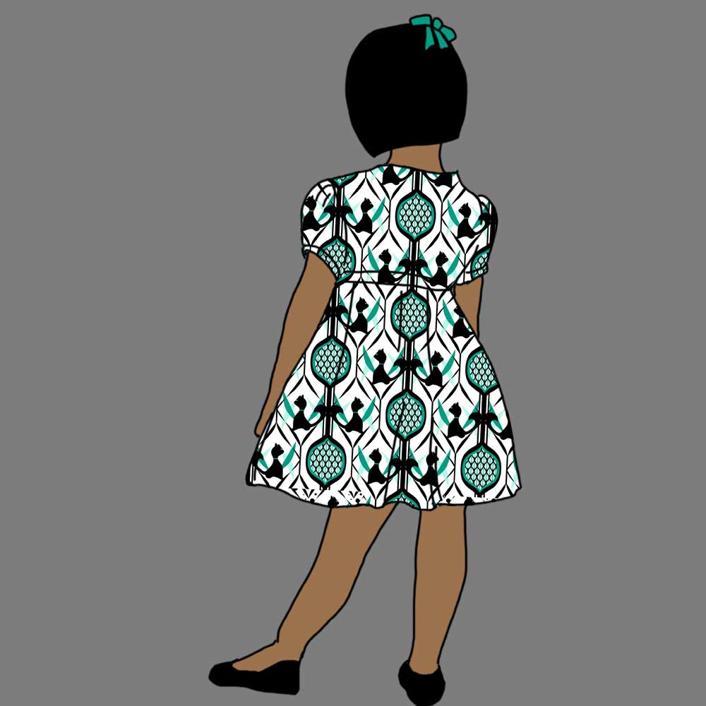 Child's dress with black and white cats and teal pattern