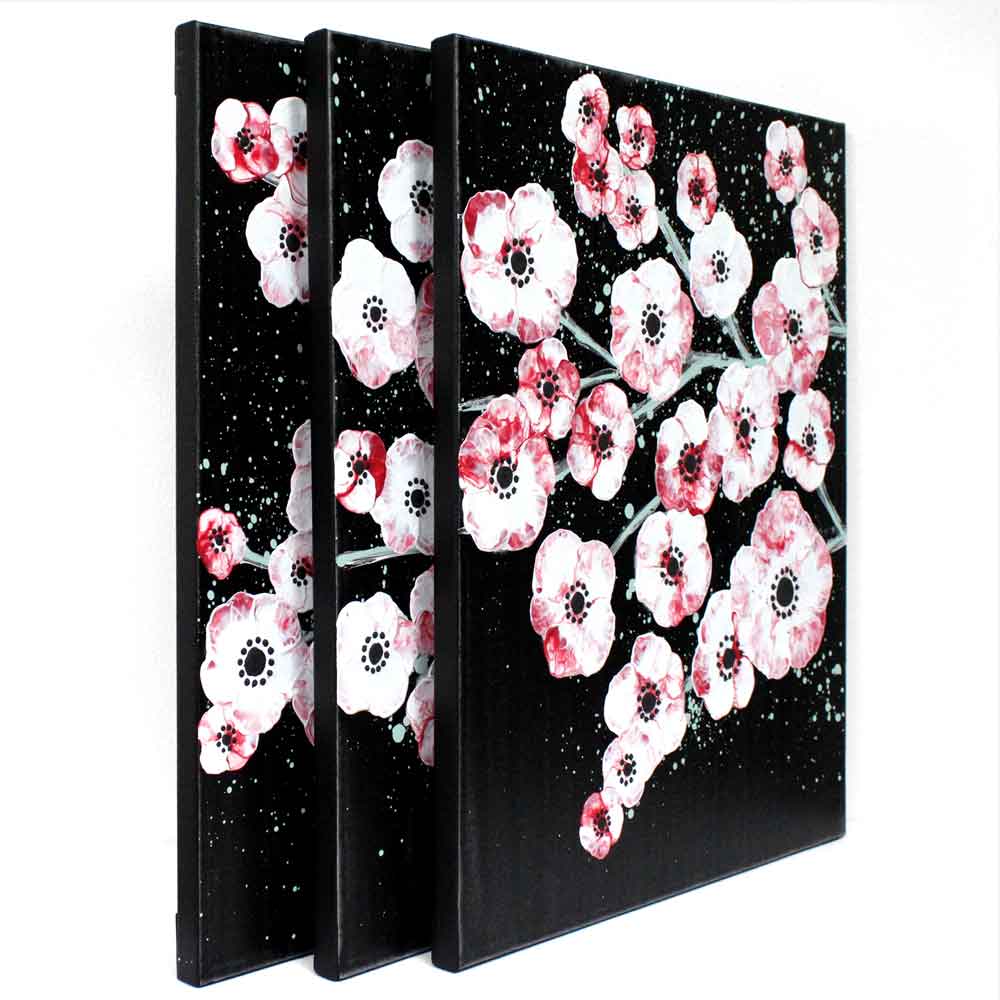 Side view of office wall art red and black cherry blossoms