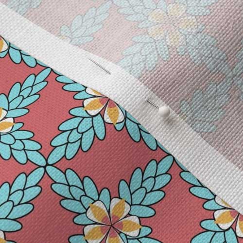 Pinned fabric swatch of punch and aqua trellis fabric