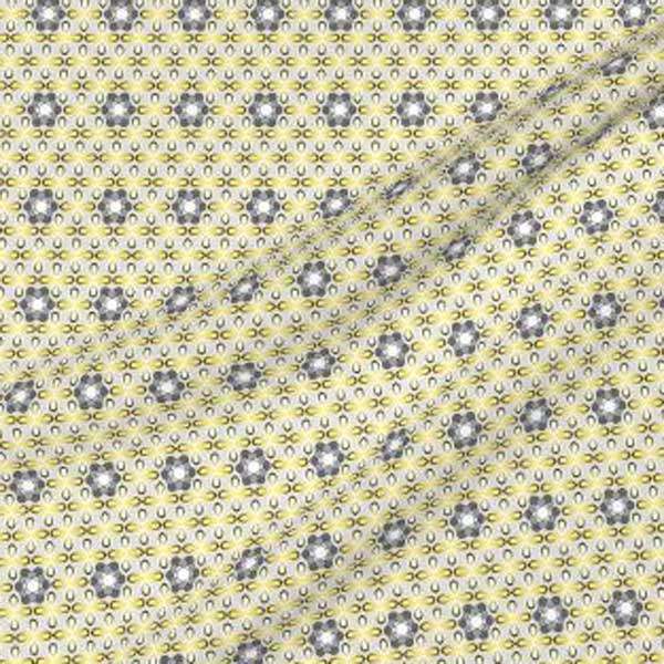 Fabric with geometric flowers in yellow and gray