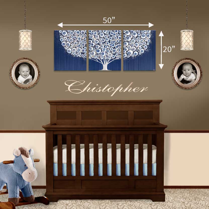 Setting of crib for wall art of tree in indigo blue and brown gray