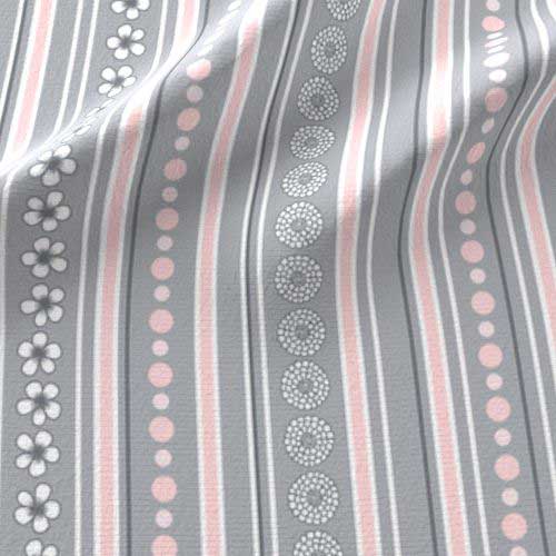 Nursery fabric stripes in pink, gray, and white with flowers