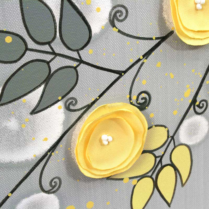 Close up of nursery art triptych gray yellow flower