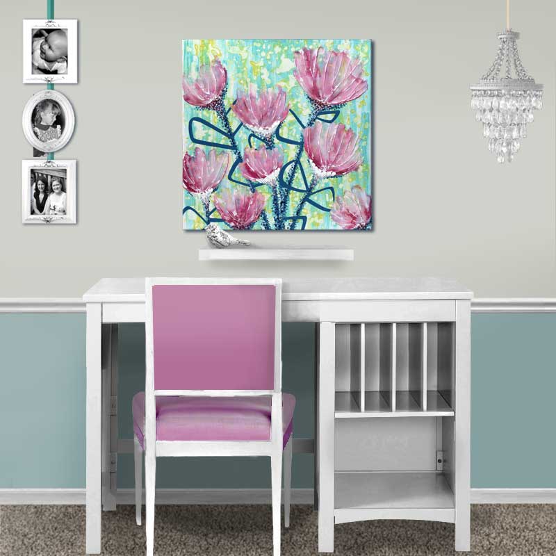 Setting of wall art of spring flowers in pink and blue