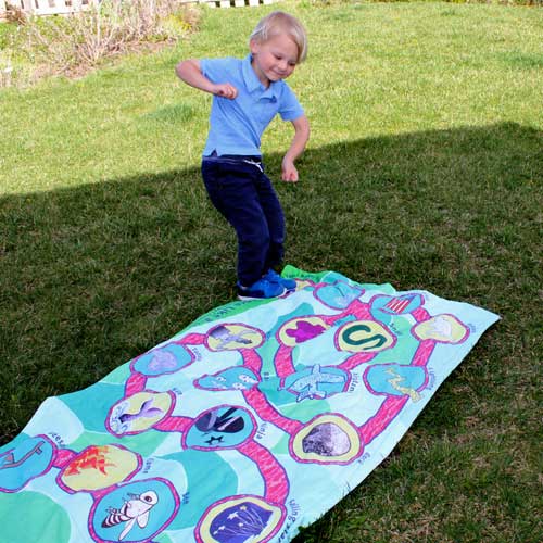 Happy dance on the front of play mat