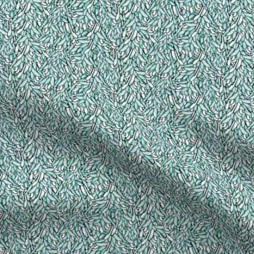 Waterfall of teal leaf patterned fabric