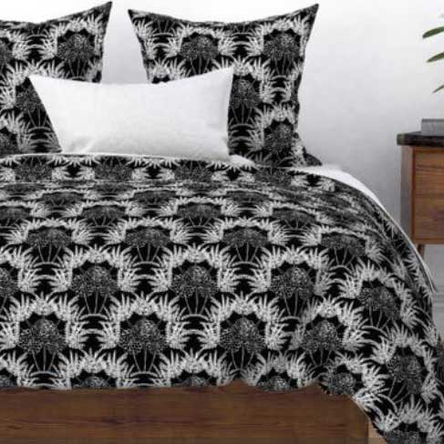 Black and white fern fabric on duvet