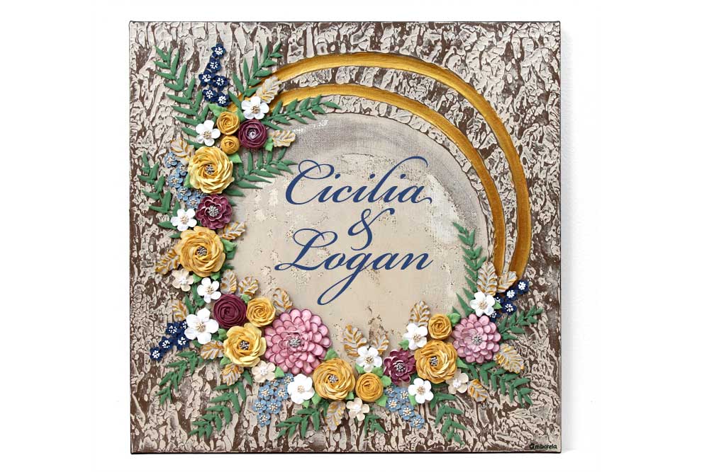 Front view of rustic floral wedding art with name inscription