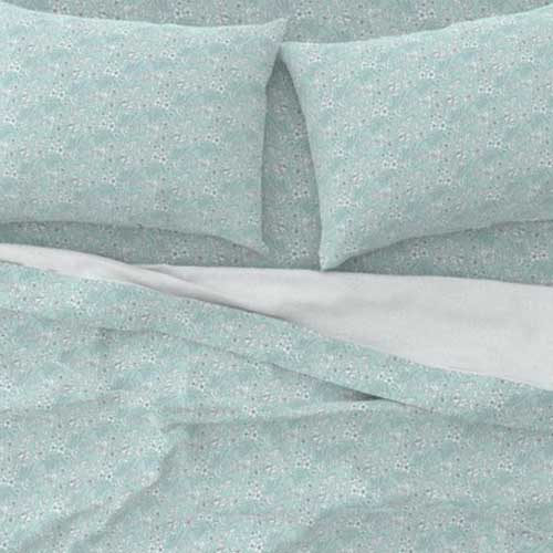 Bed sheets with country floral in teal and white