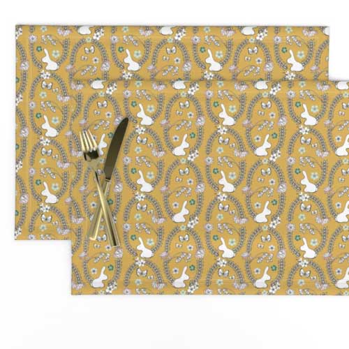 Placemats with goldenrod bunnies and flowers