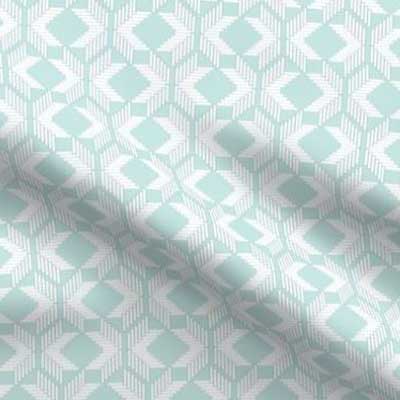 Woven fabric pattern in soft teal