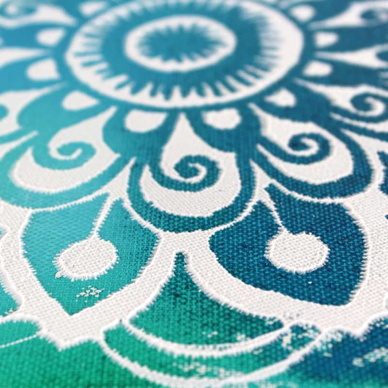 Details on art with blue and white mandala