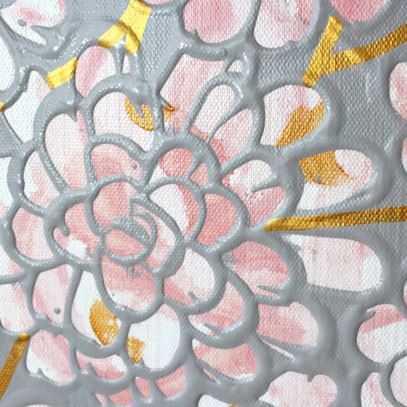 Close up of pink and gray floral tree nursery art