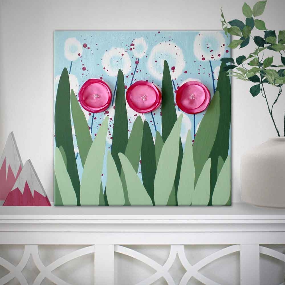 small painting with fuchsia pink flowers in green leaves