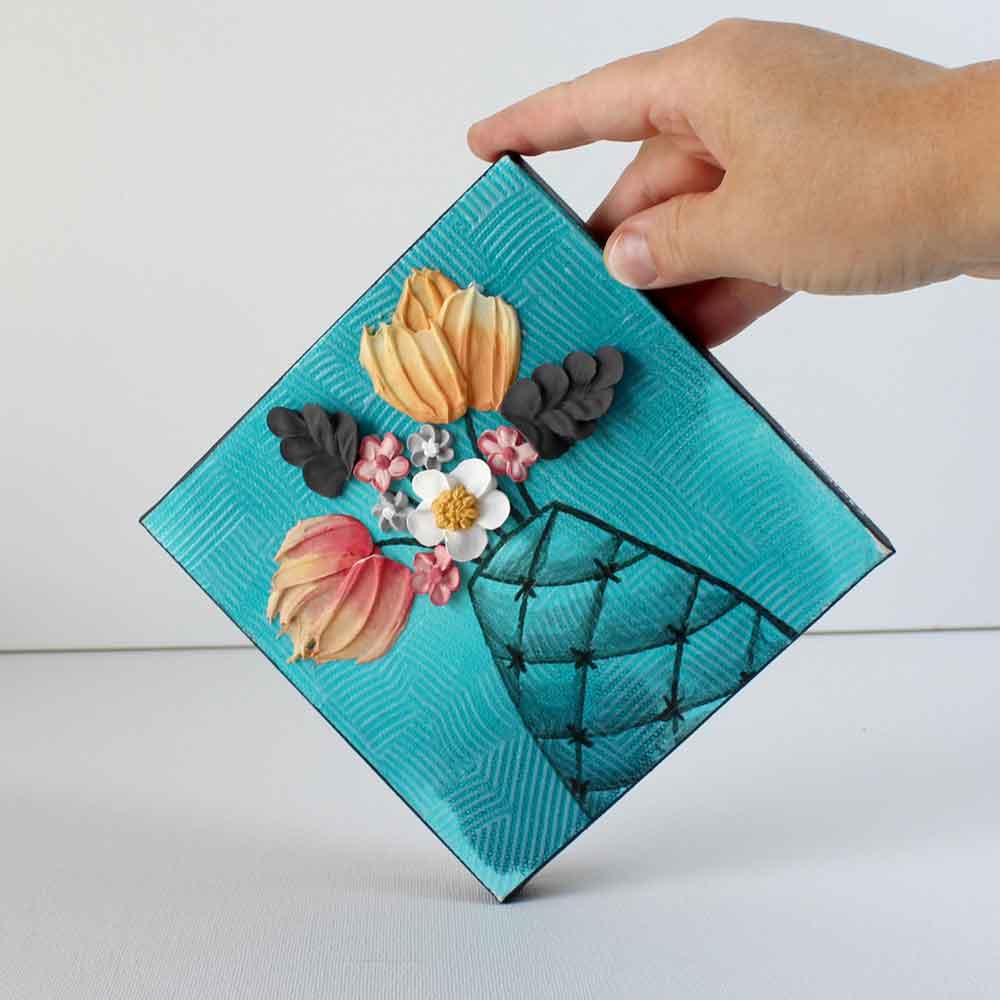 Teal and orange flower bouquet painting on a miniature textured canvas