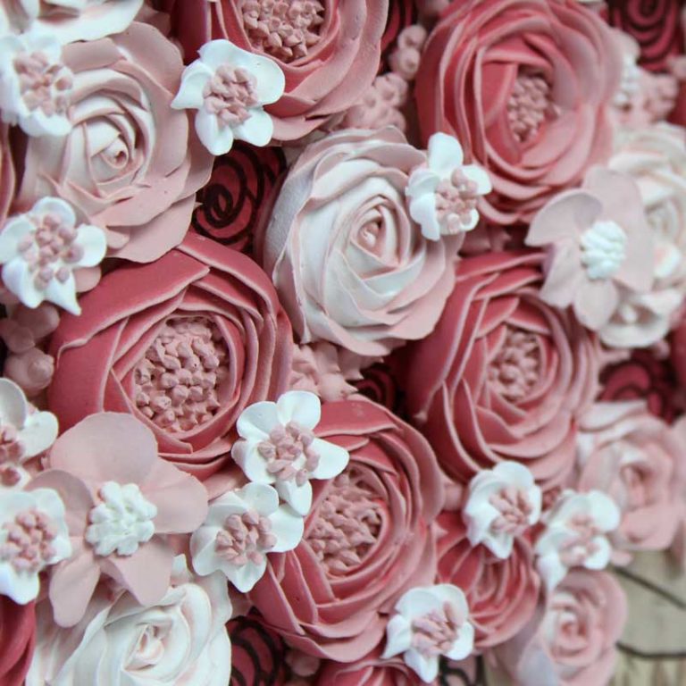 Close up of pink and brown rose bouquet art