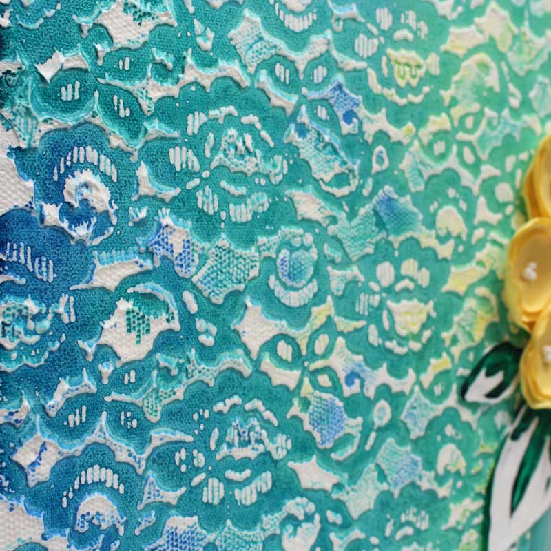Close up of background on yellow and teal floral still life