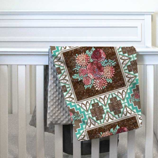 Boho baby quilt with dahlias