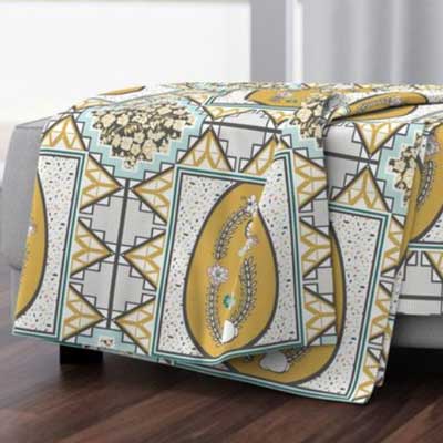 Throw blanket with yellow woodland quilt blocks