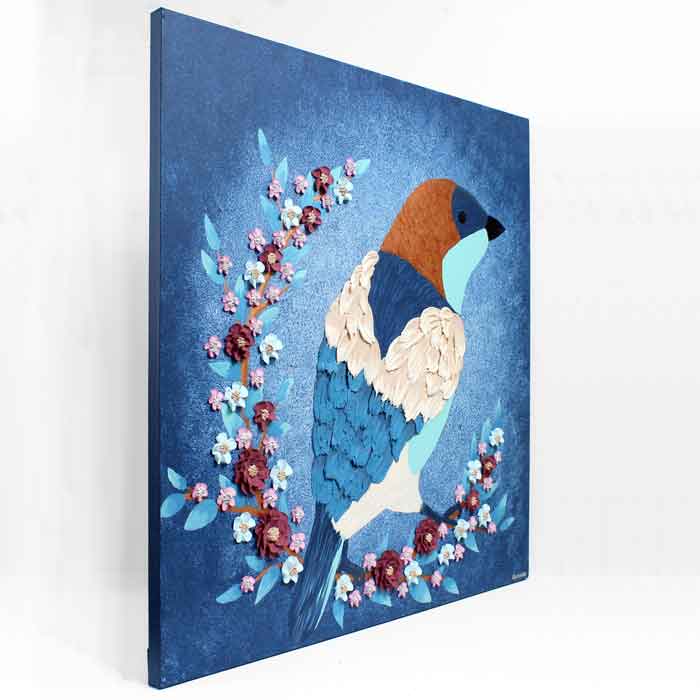 Side view of painting of bird on indigo flower branch