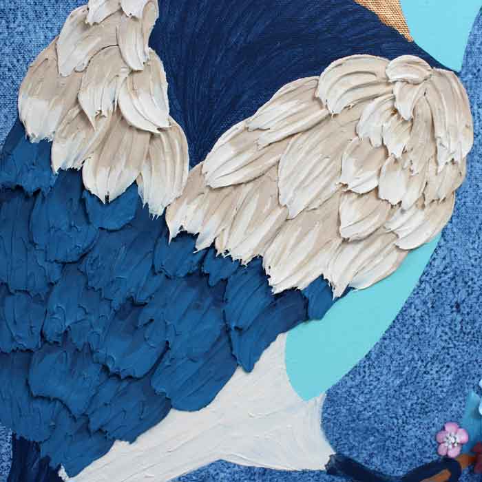 Textured feathers on painting of bird on indigo flower branch