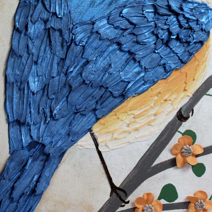 Sculpted feathers on blue sparrow painting