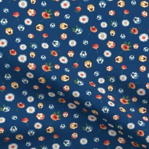 Fabric vintage style ditsy floral on dark blue