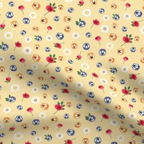 Fabric with wonderland flowers on yellow in ditsy scale