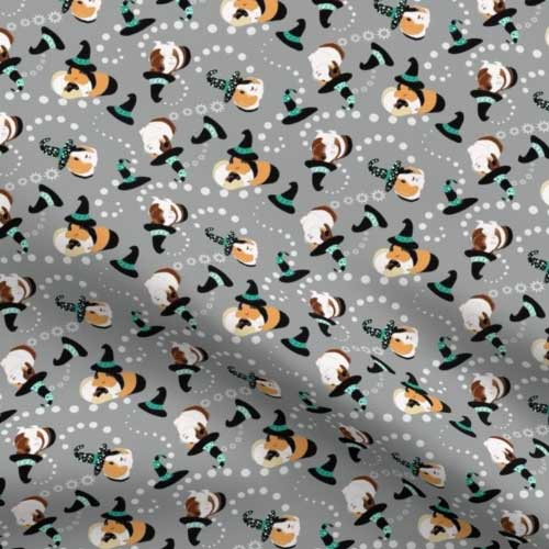Fabric with guinea pigs swirling with witch hats