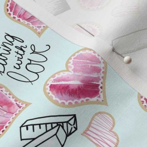 Close up of fabric with Valentine heart cookie baking