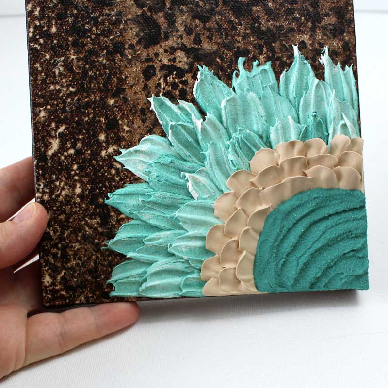 Center view of teal sunflower impasto painting on mini canvas